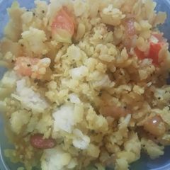 A picture of Spicy tomato poha.