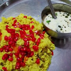 A picture of Khichdi and raita.