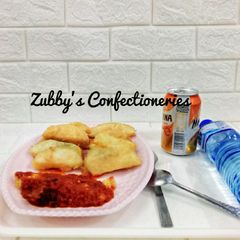 A picture of Fried yam in egg(golden yam).