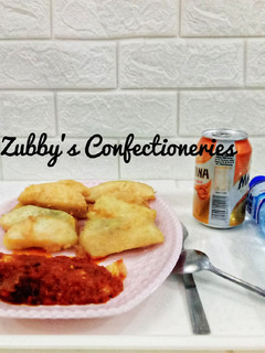 A picture of Fried yam in egg(golden yam).