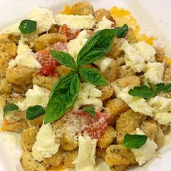 Fresh Herb Gnocchi with Tomato, Basil and Mozzarella A picture of Fresh Herb Gnocchi with Tomato, Basil and Mozzarella.
