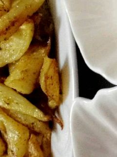 صورة لوصفة بطاطس بالفرن مع صوص الجبنه