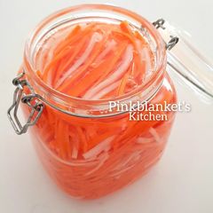 A picture of Pickled Carrots and Daikon (Long White Radish).