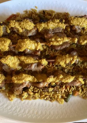 A picture of California Farm Pork Skewers in Peanut Sauce.
