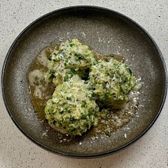 A picture of Spinatknödel with Parmesan (Spinach Dumpling).