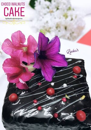 A picture of Choco walnuts Cake with glazed chocolate.