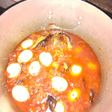 Tomato stew with smoked fish and eggs