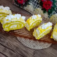 Mango swiss roll 🥭🥭 A picture of Mango swiss roll 🥭🥭.