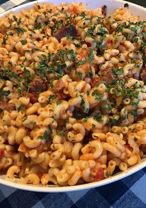 Une photo de One pot pasta au caribou,tomates et oignon