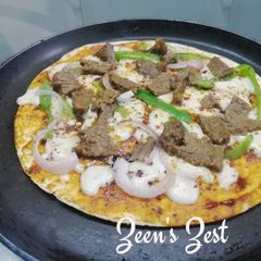 A picture of Tortilla Non-Veg Pan Pizza.