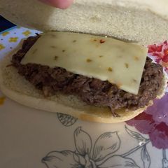 A picture of Slow cooker spicy beef sandwiches.