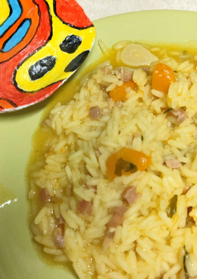 Una foto de Arroz con calabaza y jamón