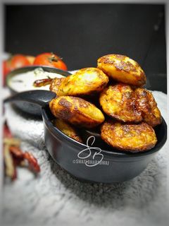 টমেটো পানিয়ারাম(Tomato Paniyaram recipe in Bengali) রেসিপির প্রধান ছবি