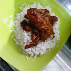 A picture of Rice with sauce.