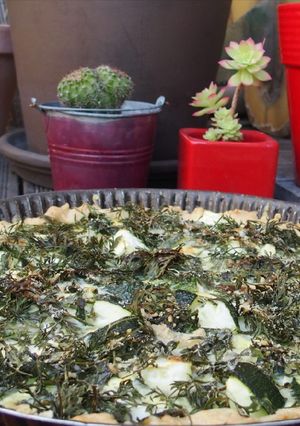 Une photo de Tarte aux courgettes et fanes de carottes
