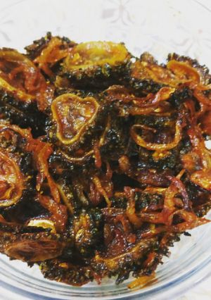 A picture of Fried Bitter Gourd or Karela Bhaja.