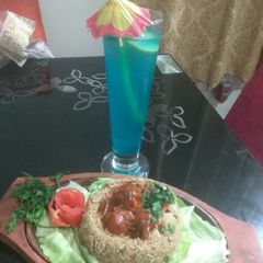 A picture of Vegetables fried rice with Manchurian.