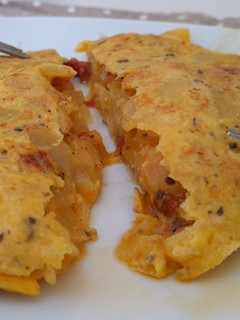 Una foto de Tortilla de patata con Tomate seco y parmesano