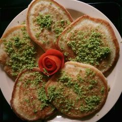 A picture of Drop Scones with lemon zest.
