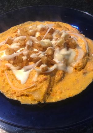 Una foto de Enchiladas con papas