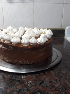 Una foto de Torta dulce de leche y merengue. Grace