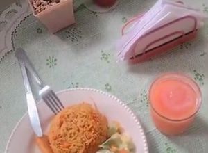 Una foto de Arroz de pollo con base de coco 🥥