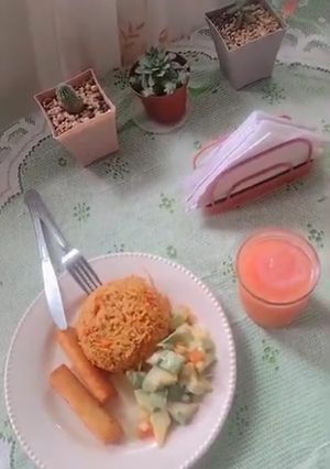 Una foto de Arroz de pollo con base de coco 🥥