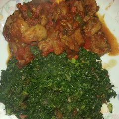 A picture of Fried goat meat with sukuma.