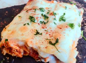 Foto principal de Canelones de pollo picante mechado con bechamel de Almendras