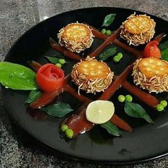A picture of Monaco stuffed sev puri.