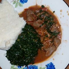 A picture of Spinach with managu  with liver and ugali.