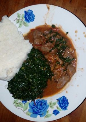 A picture of Spinach with managu  with liver and ugali.