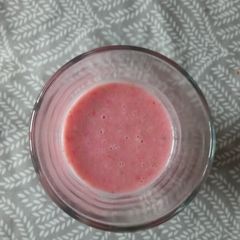 A picture of Pink strawberry and peanut smoothie.