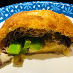 A picture of Roast Beef 🥩 and Provolone Stromboli.