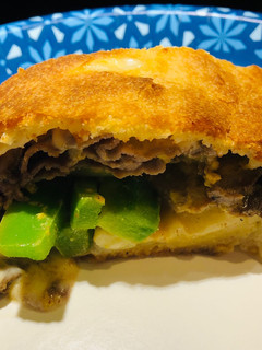 A picture of Roast Beef 🥩 and Provolone Stromboli.