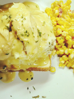 A picture of Crockpot Chicken & gravy & mashed potatoes on Texas bread.