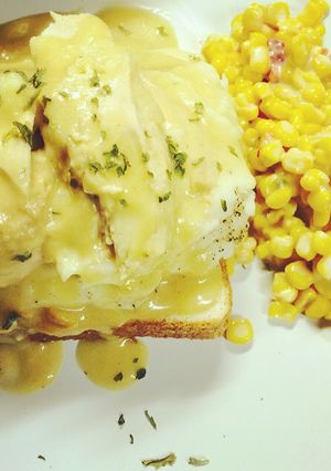 A picture of Crockpot Chicken & gravy & mashed potatoes on Texas bread.