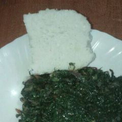 A picture of Its dinner time.... Have some ugali and kales.
