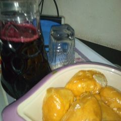 A picture of Moi moi with zobo drink.