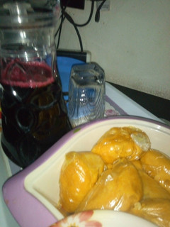 A picture of Moi moi with zobo drink.
