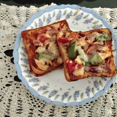 A picture of Homemade bread pizza.