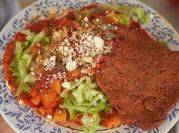 Una foto de jitomates con oregano