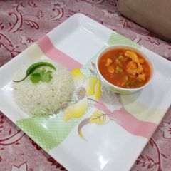 A picture of Chicken shashlik gravy with garlic zeera fried rice.