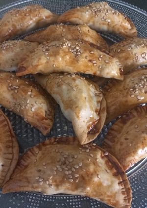 Una foto de Empanadillas de manzana, arándanos y nueces