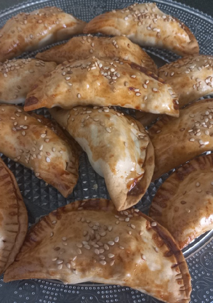 Una foto de Empanadillas de manzana, arándanos y nueces