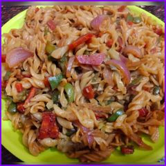 A picture of Pasta with vegies.