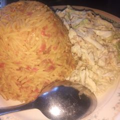 A picture of Fried cabbage with eggs.