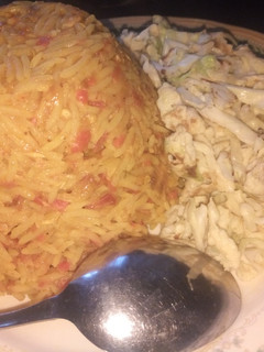 A picture of Fried cabbage with eggs.