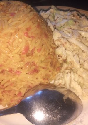 A picture of Fried cabbage with eggs.