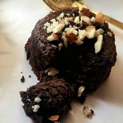 A picture of Dark chocolate walnut almond cake.